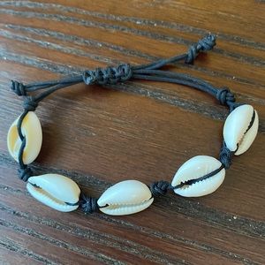 Adjustable shell bracelet purchased in Greece.  Never worn